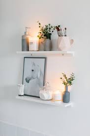 Bathroom Shelving With Candles White Blush And Grey Small Bathroom Renovation Bathrooms Small Bathroom Renovation Bathroom Shelf Decor Small Bathroom Decor