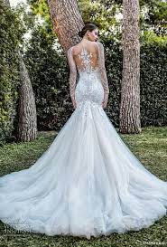 This gown is a show stopper with its gorgeous lace accented leaf shaped cathedral train. Demetrios Capsule 2020 Wedding Dresses Sophistique Bridal Collection Wedding Inspirasi Wedding Dresses Wedding Dress Long Sleeve Mermaid Wedding Dress