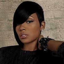 The feathery bangs and layered side pieces curve towards the cheekbones and frame #27: 27 Piece Short Quick Weave Hairstyles Short Hairstyles Short Quick Weave Hairstyles Quick Weave Hairstyles Monica Hairstyles Short Hair Styles African American
