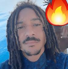 Jumping into the Grotto at Staniel Cay, Bahamas