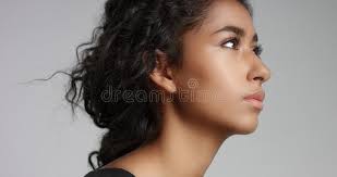 Soft light brown hair this light brown hair is subtle and pretty with chocolate undercurrents and a hint of warm sheen achieved with some lighter hair dye. Young Girl With Perfect Light Brown Skin And Beautiful Curly Black Hair Smiling At The Camera Stock Image Image Of Cream Attractive 101383317