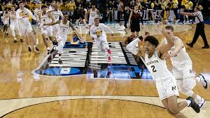 Freshman Guard Jordan Poole Hits 3 At Buzzer To Give Michigan Win Michigan Sports Michigan Cheerleading Pyramids