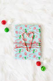 Are you looking for a free christmas candy wrapper template? Steal These Holiday Gift Wrapping Ideas Diy Candy Cane Themed Paper