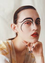 a diverse cast of models capture wild and dramatic beauty looks