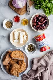 Dakos A Fantastic Greek Bruschetta Olive Mango Greek Snacks Whole Food Recipes Bruschetta