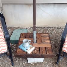 It's made entirely out of 2x4's, making it a great building project for a beginner. Make Your Own Umbrella Stand Side Table