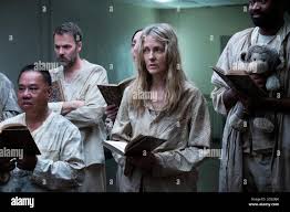 INTO THE DARK, background at left: Barry Watson; center: Lilli Birdsell;  right: Dean Sharpe, The Current Occupant , (Season 2, ep. 210, aired July  17, 2020). photo: Patrick Wymore