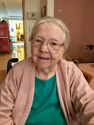 Can someone darken and sharpen this photo of my deceased sister for her  obituary?