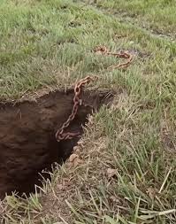 While digging to replace our mailbox, we discovered this metal object  around 8 inches deep — it’s got a chain, but we have no clue what it is.  Thoughts?👇 | Vartem | Facebook