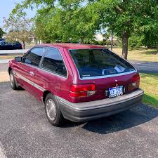 Image result for Light Beige 1989 Tracer