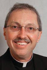 Bishop installs new pastors around Diocese