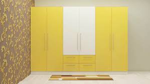 Instead simply replacing the wardrobe doors will help save you money and provide you a completely new look at an identical moment. A Wardrobe With Yellow And White Color Combination Gives An Attractive Look This F Contemporary Bedroom Design Luxury Furniture Stores Modern Furniture Stores