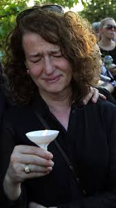 Grief in small town: March honors victims of newsroom attack