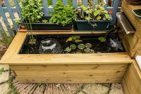 This is not a biofilter, but you can pump the water from this filter to a biofilter then to your pond or water cut holes in the lid of the drum to allow room for the saws all blade to cut the lid off. Raised Timber Pond With Waterfall And Bench 8 Steps With Pictures Instructables