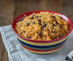 Arroz y habichuelas (yellow rice with beans or puerto rican rice and beans…this recipe!) ♦ olives are also usually added to puerto rican rice and beans. Arroz Con Gandules Analida S Ethnic Spoon