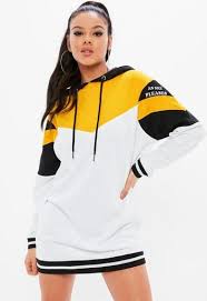 Black And Yellow Jersey Dress This Long Sleeve Jersey Dress Features In A Black Hue With Yellow And White Color Block Design Hooded St Long Sleeve Jersey Dress Trendy Outfits Jersey Dress