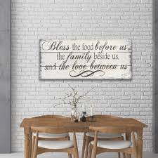 The walls in a dining room provide the perfect opportunity for you to make the dining room feel truly your own. Bless The Food Dining Room Wall Decor Rusticly Inspired Signs
