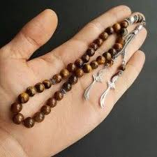 Kaplan Gozu Dogas Tas Tesbih Zulfikar Uclu Manner Tattoo Ideen Tattoo Ideen