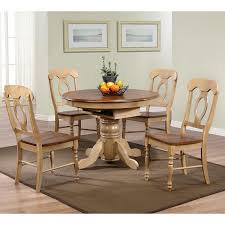 This dining table offers a contemporary yet rustic vibe and can extend to fit up to 8 people. Round Dining Table With Leaf Extension Ideas On Foter