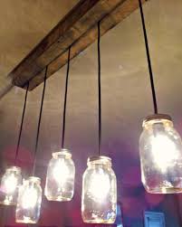 Fabriquer Suspension Palette Bois Cables Bocaux Mason Fabriquer Une Suspension Diy Luminaire Lumieres En Bocaux Diy Lampe