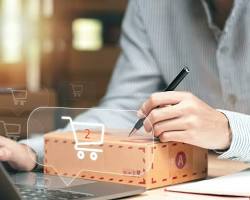 person managing an online store from their laptop resmi