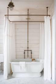 Product title steel shower curtain tension rod average rating: A Diy Shower Curtain Hoop Made From Brass Pipes By Zio Sons Clawfoot Tub Shower Diy Shower Curtain Bathrooms Remodel