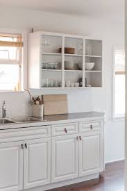 Pale And Interesting An Artful And Economical Renovation In Vancouver Bc Remodelista Sourcebook For The Considered Home Upper Kitchen Cabinets Open Kitchen Cabinets Kitchen Cabinets