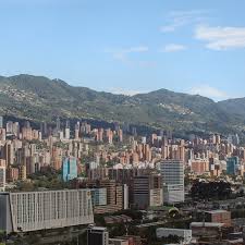 Medellin is located at the base of the aburra valley and surrounded by mountains. Medellin