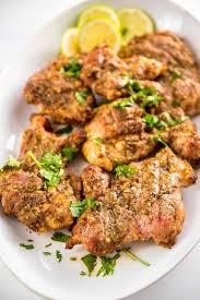 In table below you can also see calories amount for four and five grilled chicken thighs. How To Grill Chicken Thighs Garnished Plate