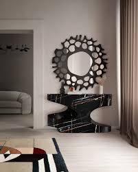 So check out these ideas on how to decorate your foyer and make a great first impression on your you can also add a console table or even a round table. 15 Contemporary Console Tables In Celebrities Living Room Sets