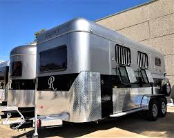 Brand new 2Hal-Lux Square front Warm Blood, just finished and ready to go.  Normal Lux spec, including large kitchen area, top bunk, fold up barrier  beds, water tank/pump/sink & external tap, 240v