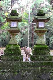 Where they can still be found in buddhist temples and chinese gardens. Deer Between To Stone Lantern Toro In Nara Japan Stock Photo Picture And Royalty Free Image Image 84304618