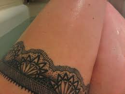 Olympic rings and garland tattoo. Garder Belt Tattoos