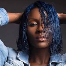 This black hair has a hint of a blue hue to it. 11 Exotic Blue Hairstyles For Black Girls Hairstylecamp