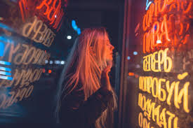 Tons of awesome yellow neon wallpapers to download for free. Wallpaper Woman In Black Long Sleeve Shirt Standing Near Red And Yellow Neon Light Signage Background Download Free Image