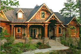 Wood, stone and brick, heavy trim, corbels, beams and tapered or squared entry columns are usually found on the exterior of the craftsman. Craftsman House Plans Craftsman Style Home Plans