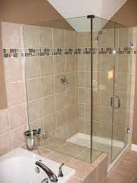 Maybe you would like to learn more about one of these? Tiny Bathroom Ideas Brown Ceramic Tiles Glass Shower Bath White Bath Up Dickoatts Com Bat Bathroom Remodel Shower Bathroom Shower Design Small Bathroom Tiles