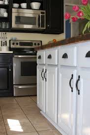 There are many reasons you might decide to use a mismatched cabinet design for your kitchen. Keywords Design Ideas Pictures Remodel And Decor Kitchen Cabinets Black Kitchen Cabinets Kitchen Cabinet Design