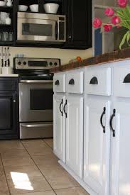 There are many reasons you might decide to use a mismatched cabinet design for your kitchen. Keywords Design Ideas Pictures Remodel And Decor Kitchen Cabinets Black Kitchen Cabinets Kitchen Cabinet Design