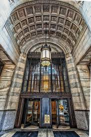 New York Life Building Rises Forty Stories To Its Pyramidal Gilded Roof And Occupies The Full Block Betwee Woolworth Building New York Life Salisbury Cathedral