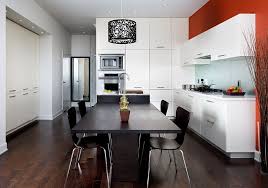 Single wall kitchen with red cabinets and black island. Black And White Kitchen Ideas Chartwell
