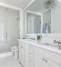 All White Bathroom With Large Mirror All White Bathroom Classic White Bathrooms White Bathroom