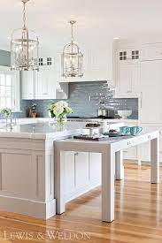 I'm about to build one and would love to know how you did. Kitchen Island Pull Out Table Design See Details On Home Bunch Blog Today Kitchen Remodel Kitchen Island Table Classic White Kitchen