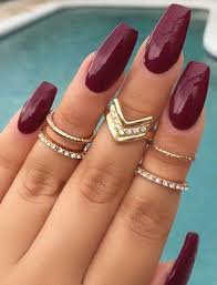 Some nails are plain, one nail is sparkly, the next has ombre and the other nails are decorated with rhinestones. Dark Red With Images Maroon Nails Nails Tumblr Burgundy Nails