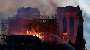 Macron Promises To Rebuild Notre Dame Cathedral After Fire Seeks International Help Cbc News