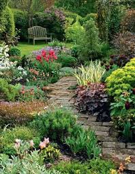 Like The Diagonal Pavers And Full Flower Beds Flowers Low Enough They Don T Block The View Then A Shrub A Beautiful Gardens Cottage Garden Garden Inspiration