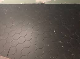 They complimented it (and lightened it up) with a white and light wood vanity which helps both tiles and patterns work my tip is to use the same grout colour as they used in the showroom where you fell in love with the tile. Black Grout With Black Tile Or Contrasting
