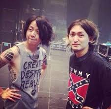 He played drums for the band's earlier indies until officially joining on 2007. 17 Tomoya Tattoo Ideas One Ok Rock Japanese Rock Rock Bands
