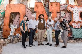 You will likely see many women watching. Laid Back Las Vegas Wedding With A Neon Graveyard Ceremony Pizza Reception Rock N Roll Bride