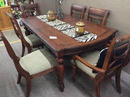 Kitchen table games, saint petersburg, florida. Ashley Serengeti Kuli Wood And Leather Dining Set